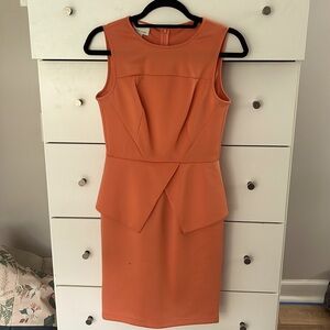 Orange peplum sleeveless dress